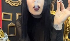 Smoking a cigarette in a teasing outfit