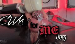 Rubber gimp made to cum in chastity cage