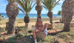 Latina, naked slut in front of the beach, playing with my pussy
