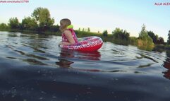 Alla swims on the lake and wears an inflatable vest and plays with an inflatable ring!!!
