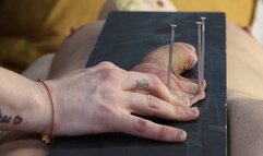 balls nait to a board and then a massager on top this bitch comes hard on cbt