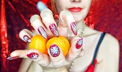 Christmas aesthetic hands fingering tangerines