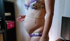 Stuffed belly slapping in lingerie