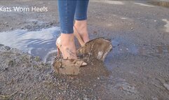 Playing in Puddles Wearing my Louboutin So Kate Patent Stilettos