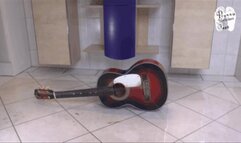 Guitar crushed under Converse Sneakers