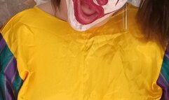 clown girl blowing punchballoons