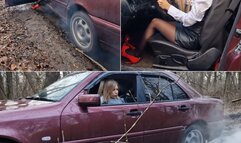 Lucy is lost and desperately trying to get out of the mud in an old Mercedes