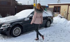 girl tries to start the car, but nothing works