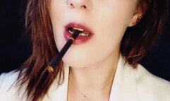 Inhaling elegance smoking an all black cigarette, exhaling dreams with every puff