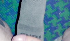 Femdom Milf Goddess gives hard sock job in dirty sock kicking and rubbing tattooed cock with an explosive cumshot