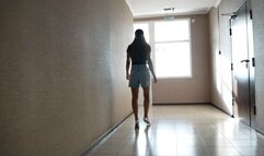 Girl walking on dirt, walking on pictures of a man, crushing