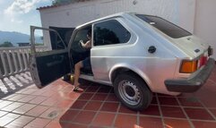 Mrs Barbara cleans the fiat 147 carburettor