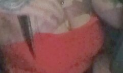 Crystal drives to party in sexy orange top with a stall