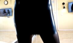 Hottie in tight latex dress shows off her long sexy legs in high heels