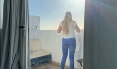 Girl stuck on balcony and has to pee in jeans