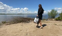 Vika in a red bikini tears her shoes on the beach_1080