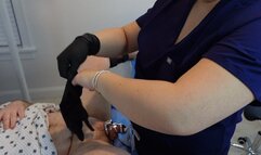 Doctor Jess performs an estim pegging on her caged patient