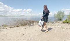 Vika in a red bikini tears her shoes on the beach_720