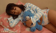 She's sick in bed and needs diapers and cummies