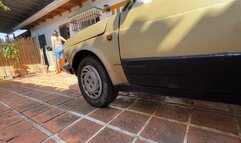 Kalinda warms up the car with brown boots