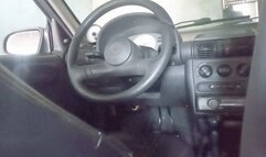 Shecamore cranking and moving the Chevrolet Corsa out of the garage (Interior)