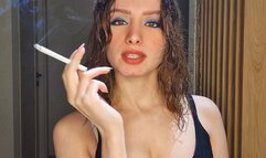 We played cards, you lost your pack of ciggies to me, so I get to smoke them and tease you with them ;) Muaa xx