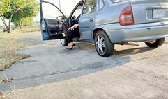 Diana Senior Cold Starting the Chevy Corsa on Black Classic Pumps
