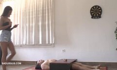 While Natasa is on the phone, the slave has an orgasm