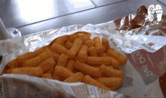 Working in the kitchen with her old worn Mules