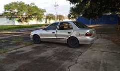 Trying to start car and drive it using huge heels (3)