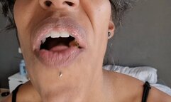 chewing crunchy chocolate peanuts