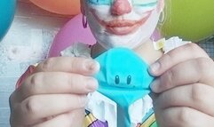 clown blowing blue smile balloon