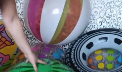 girl in sexy lingerie ride and jumping on beachballs