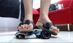 crush a very very hard RC Toycar barefeet and in 2 sandals