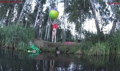 Alla plays with a large beach ball and blows it away while floating on the lake!!!