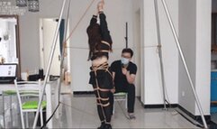 xy28-A Chinese girl wearing a black silk JK skirt and black stockings is tied up with ropes and tickled all over her body