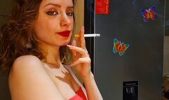 Smoking 2 Marlboro Reds in the kitchen, staining the cork filters with Red Lipstick ;) Muaa xx
