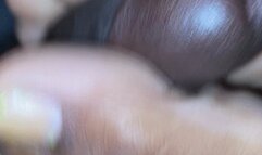 ebony Footjob works the dick aggressively