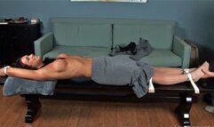 The Pretty Businesswoman Was Tied Down Topless and Her Stockinged Feet Tickled!