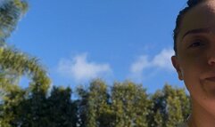 Jane is hot is a wet swim suit jumping on a huge inflatable