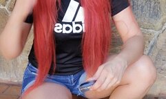 Smoking 100s cig in adidas T-shirt and vans sneakers - crush cig