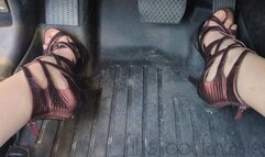 Fifi pedal pumping in red gladiator platform heels