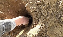 get stuck in a mountain of sand