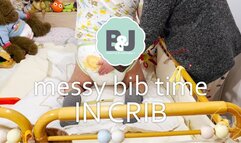 Messy bib time in crib