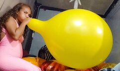Sexy Juju Sensually Blows To Pop a HUGE Yellow 24 Inch Tuftex Balloon In A Pink Jumper