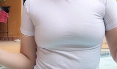 Smoking 100s wet t-shirt by the pool in the rain