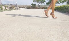 Golden heels and red nails