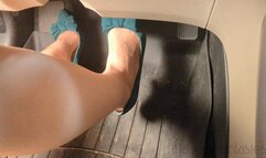 Fifi cranking her sedan in pointy teal heels and nylons