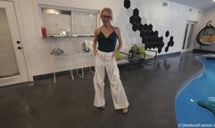 Hannah Swims wearing Fancy White Pants and Green Top