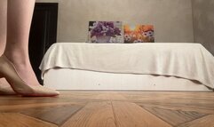 girl plays with high-heeled shoes, spits on them, kisses them and licks them